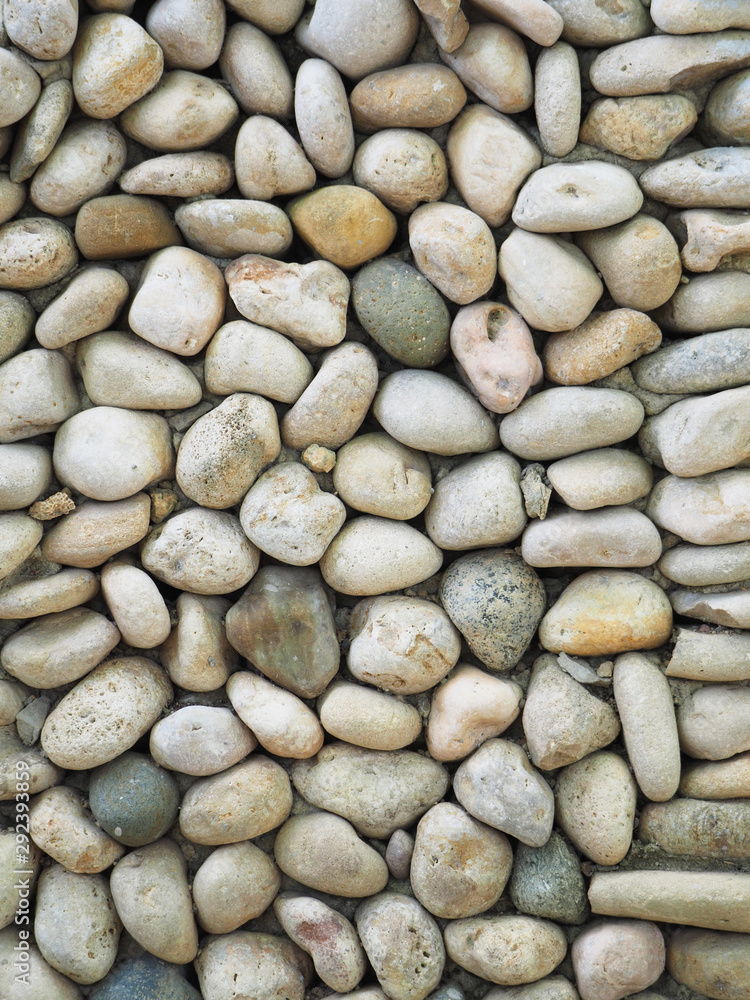 Rock wall of natural river stones Rock wall of natural river stones