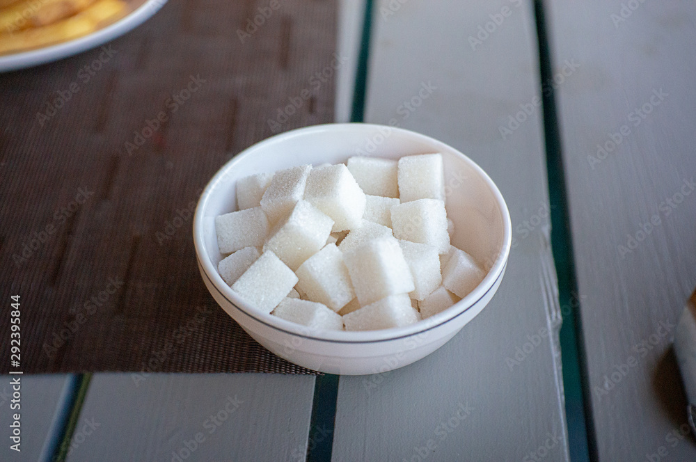 Sugar cubes on a plate in a plate Sugar cubes on a plate in a plate