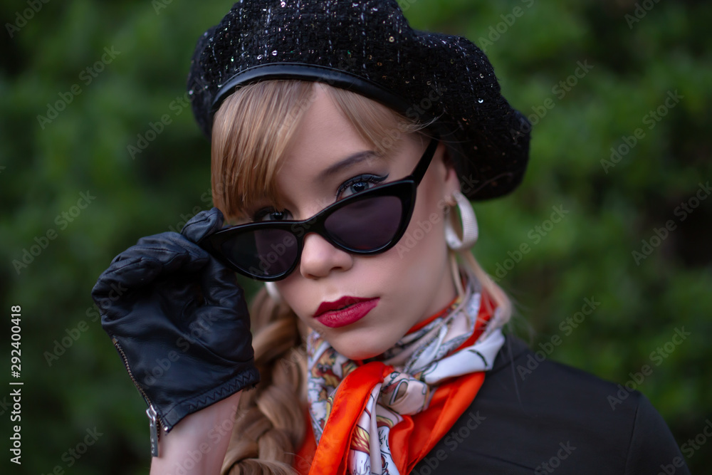 Blonde in beret, gloves and sunglasses Blonde in beret, gloves and sunglasses