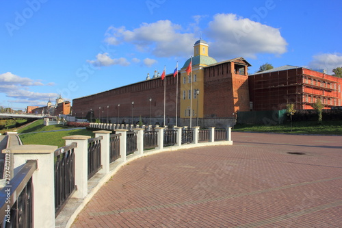Smolensk, Russia, Dnieper river embankment - view from city observation deck on Smolensk fortress wall and fencing in summer sunny day on blue sky background
