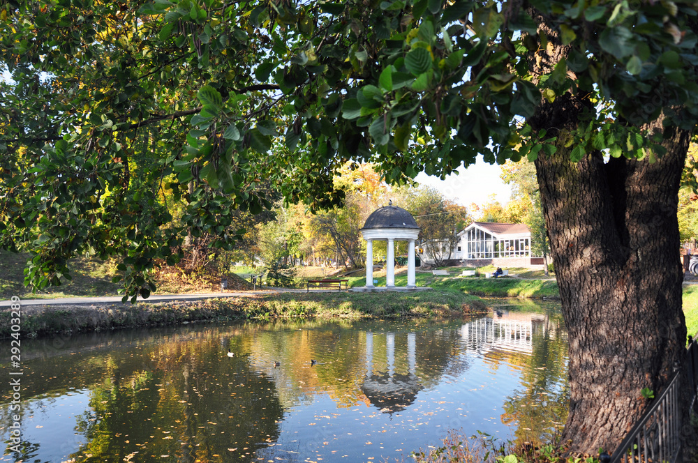 Autumn landscape of the lake surrounded by a city Park. Autumn landscape of the lake surrounded by a city Park.