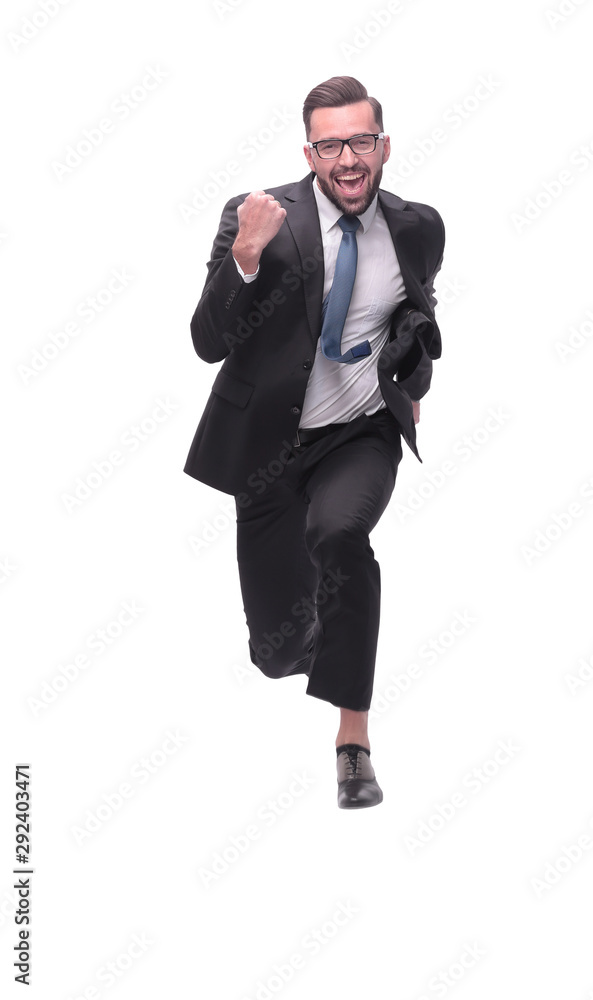 in full growth. happy dancing young businessman in full growth. happy dancing young businessman