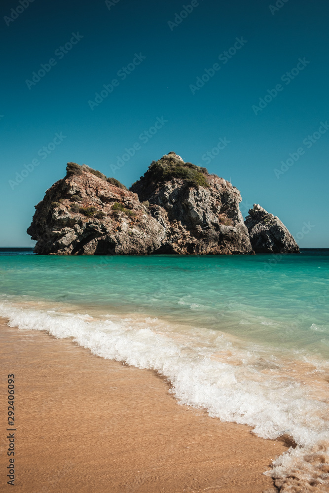 Ribeira do Cavalo beach, Sesimbra,Setubal, Portugal. Tropical paradise beach with white sand and clear water.