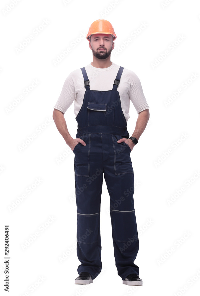 confident man in overalls . isolated on white confident man in overalls . isolated on white
