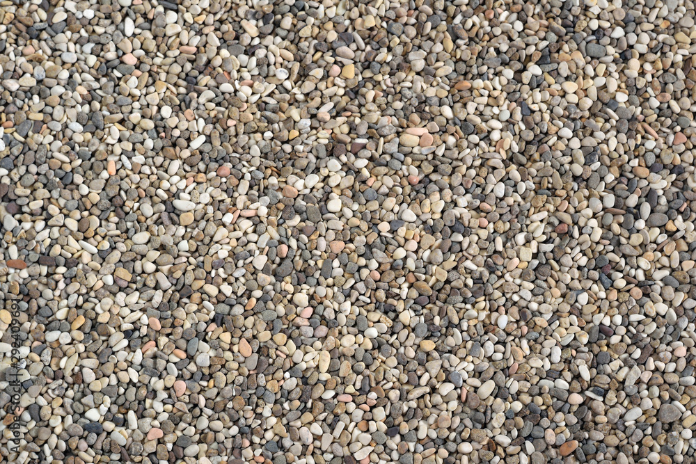 Dry aquarium sand texture background. Small fine pea gravel grains. Close up view from the top. Dry aquarium sand texture background. Small fine pea gravel grains. Close up view from the top.