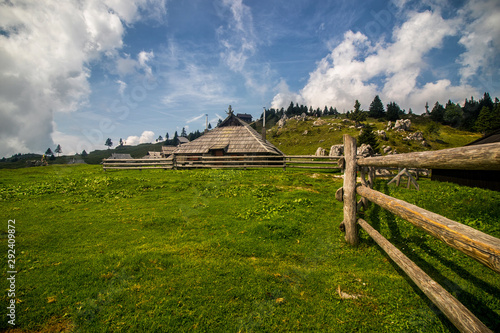 Obraz na płótnie High plateau of Velika Planina, land of pastures and alpine huts high in the mountains, Slovenian Alps w salonie