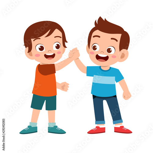 cute happy kid hand shake with friend