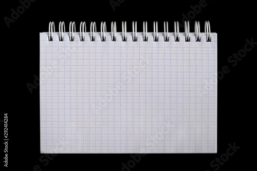 Photography Grid sheet open notebook isolated on black. Top view