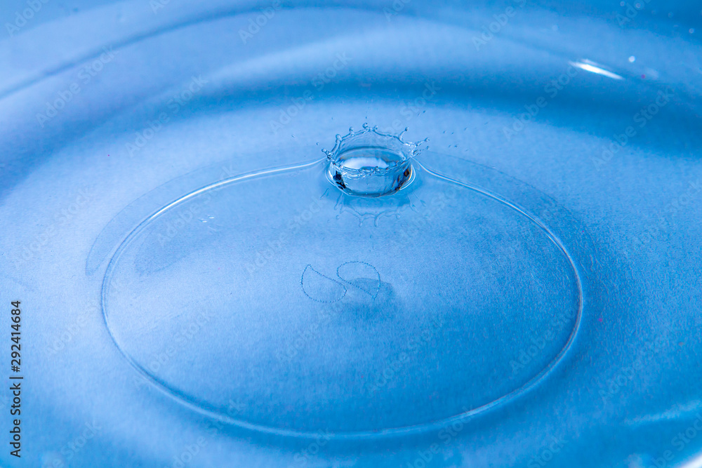 Water drops falling down. Raindrops on colorful background. Water drops falling down. Raindrops on colorful background.