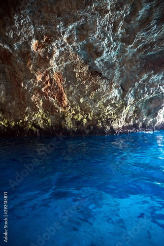 Blue Cave  Montenegro. Sea grotto with water look blue. Stone cave arch
