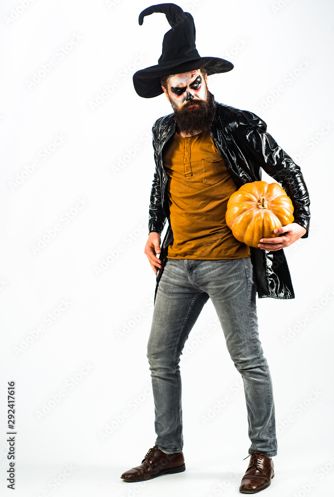 Horror faces. Vampire man on Halloween night. Scary hipster with beard in Halloween hat. Halloween concept. Halloween party and holiday concept. Horror faces. Vampire man on Halloween night. Scary hipster with beard in Halloween hat. Halloween concept. Halloween party and holiday concept.