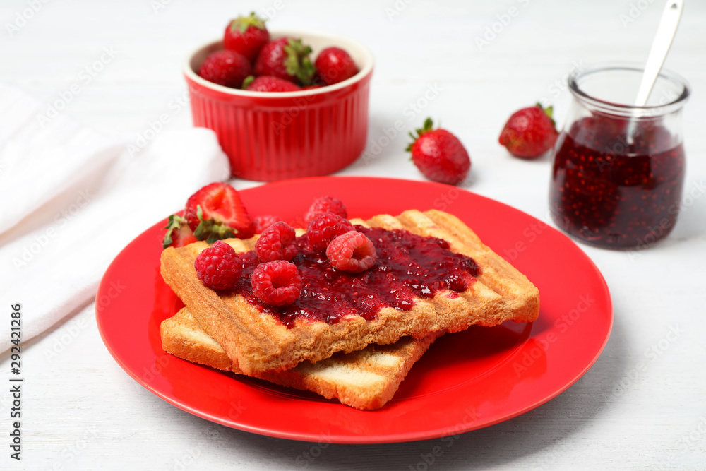Tasty breakfast with toasts served on white wooden table Tasty breakfast with toasts served on white wooden table