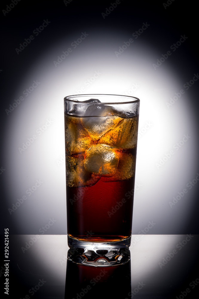 cocktail with cola on the background cocktail with cola on the background