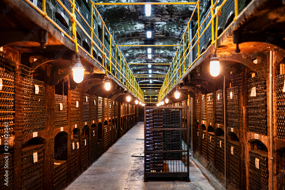 Large modern wine storage, many bottles and boxes of wine. Large modern wine storage, many bottles and boxes of wine.