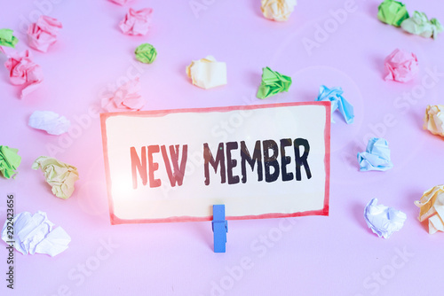 Conceptual hand writing showing New Member. Concept meaning recruiting employee to company or team Birth of fresh child Colored crumpled papers empty reminder pink floor clothespin © Artur