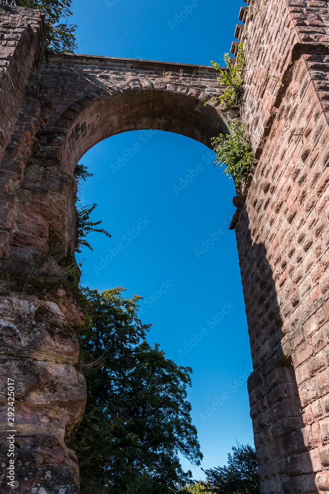 Naklejka premium A bridge between castle and tower made of red sandstone