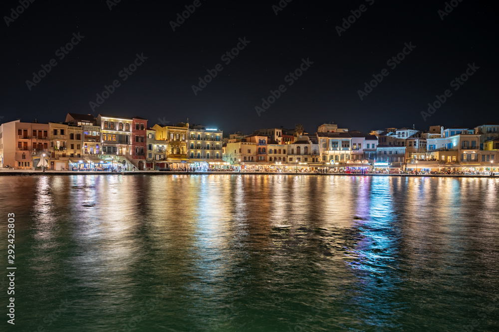 city at night by the sea