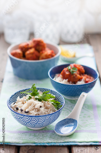 Spiced Rice with Fish Meatballs in Tomato Sauce