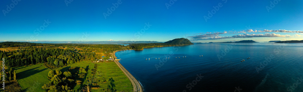 Aerial Panorama of Lummi Island, Washington. Located in the Puget Sound, Lummi Island is surrounded by the Salish Sea and is home to the famous Willows Inn and the last remaining reefnet salmon fleet.