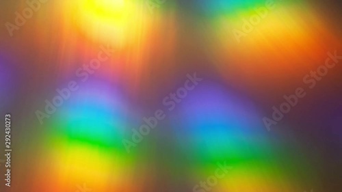 Rainbow abstract glowing light colorful defocused background. Slow motion