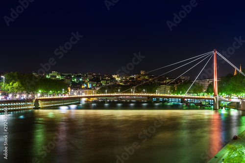 View of Suspension Bridge, Saone River at night, Lyon, France