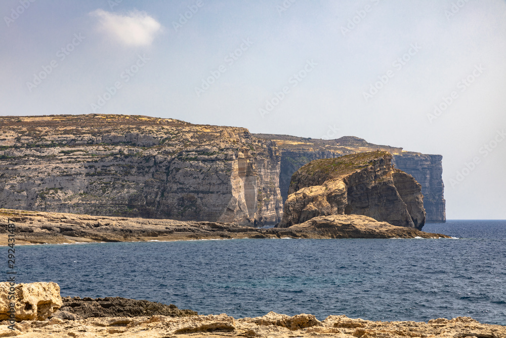 Stunning view at the coast of Dwejra Bay with the Fungus Rock on Gozo island in Malta