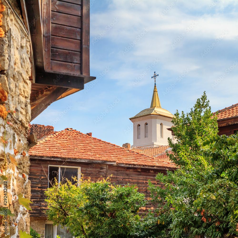 City landscape - view of the old streets and the Church of the Assumption, the Old Town of Nesebar, in Burgas Province on the Black Sea coast of Bulgaria