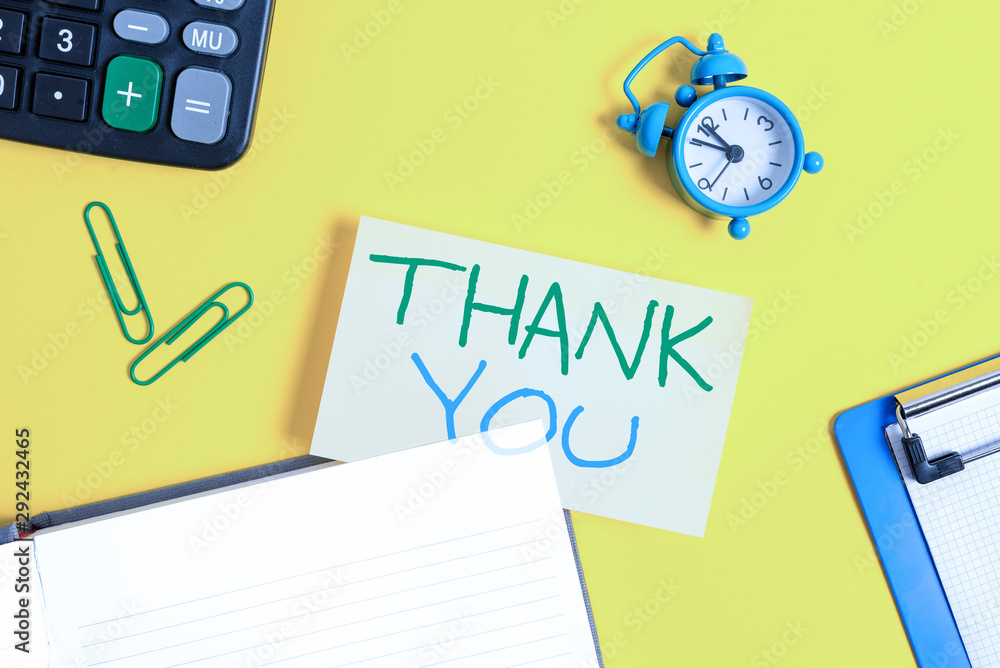 Text sign showing Thank You. Business photo showcasing replaying on something good or greetings with pleased way Empty orange paper with copy space on the yellow table
