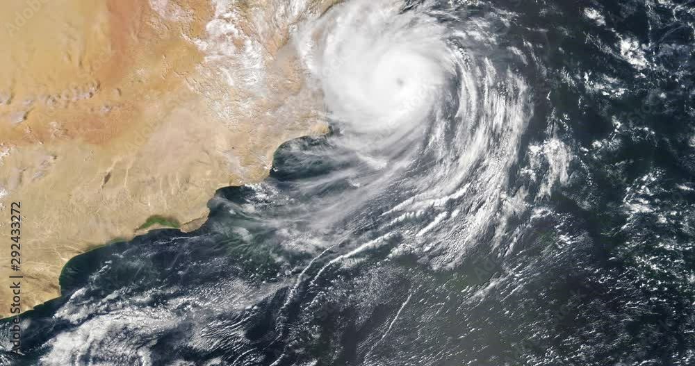 Very high-altitude overflight aerial of Tropical Cyclone Hikaa making ...