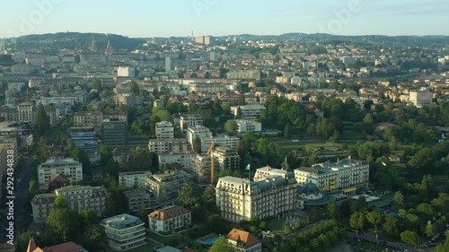 flight over lausanne cityscape sunset time aerial panorama 4k switzerland