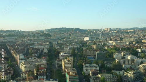 flight over lausanne cityscape sunset time aerial panorama 4k switzerland