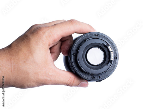 A man's hand holding a 50mm lens. Isolated from a white background.