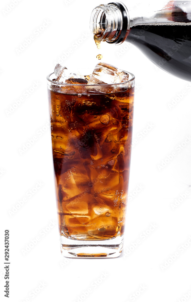 Cola in a glass with ice cubes to refresh and quench thirst Cola in a glass with ice cubes to refresh and quench thirst