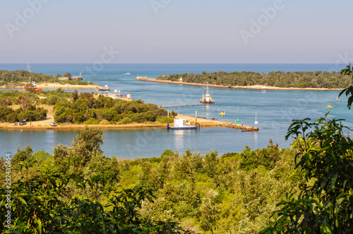 View of the Bullock and Rigby Islands and a man-made entrance into the Gippsland Lakes from the Lake Entrance Lookout - Lakes Entrance, Victoria, Australia