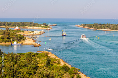View of the Bullock and Rigby Islands and a man-made entrance into the Gippsland Lakes from the Lake Entrance Lookout - Lakes Entrance, Victoria, Australia photo
