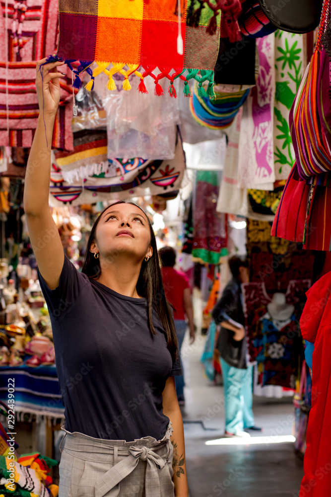 Young woman in a traditional Mexican street market 