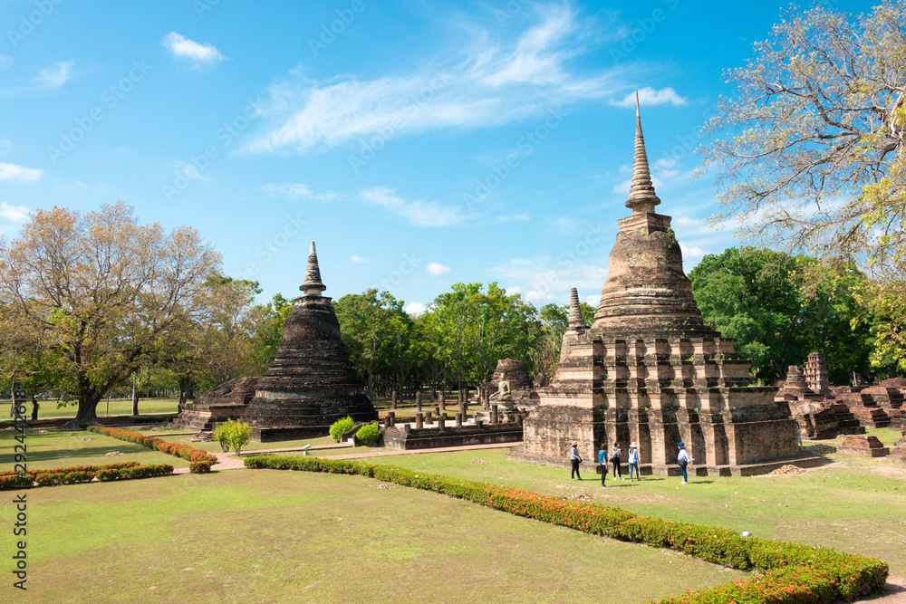 Fototapeta premium Sukhothai, Thailand - Apr 08 2018: Wat Mahathat in Sukhothai Historical Park, Sukhothai, Thailand. It is part of the World Heritage Site - Historic Town of Sukhothai and Associated Historic Towns.