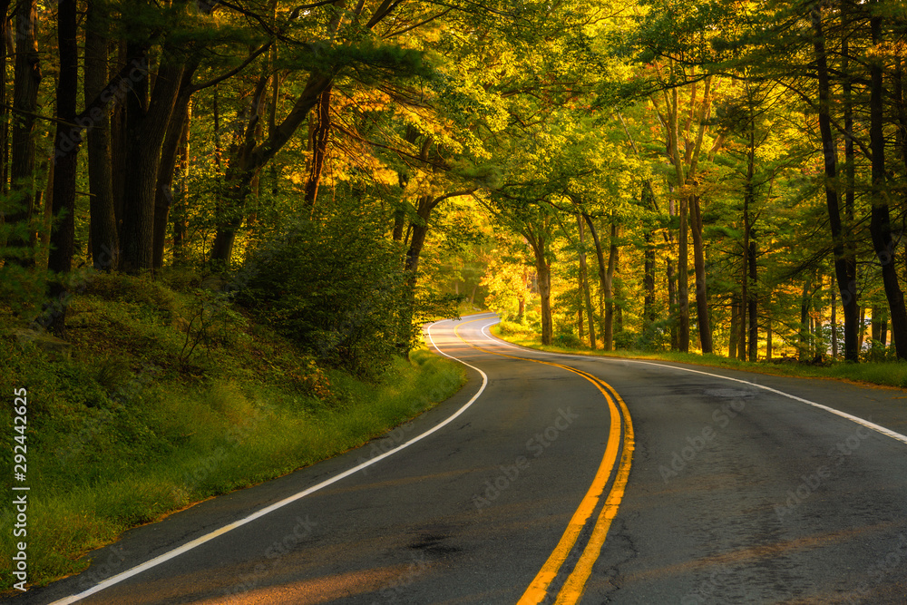 Fototapeta premium Seven lakes drive road passing through autumn trees featuring beautiful fall colors 