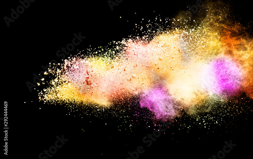 Explosion of colored powder isolated on black background. Abstract colored background. holi festival.