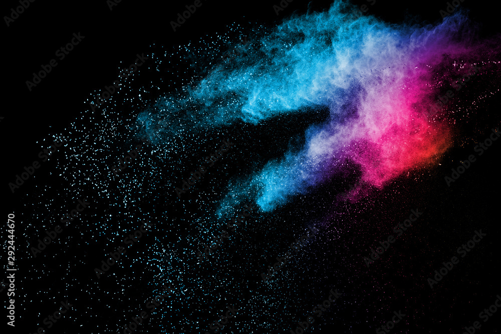 Explosion of colored powder isolated on black background. Abstract colored background. holi festival. Explosion of colored powder isolated on black background. Abstract colored background. holi festival.