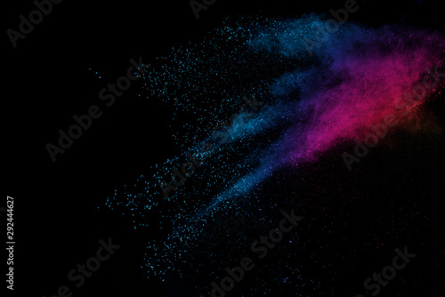 Explosion of colored powder isolated on black background. Abstract colored background. holi festival.