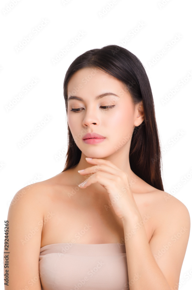 asian young beautiful woman smiling and touching her face, isolated over white background. natural makeup, SPA therapy, skincare, cosmetology and plastic surgery concept asian young beautiful woman smiling and touching her face, isolated over white background. natural makeup, SPA therapy, skincare, cosmetology and plastic surgery concept