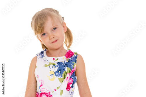 Little girl posing in the studio. Close-up.