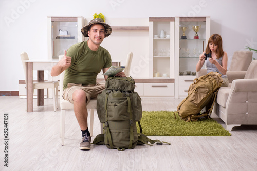 Young couple planning a trip to mountains photo