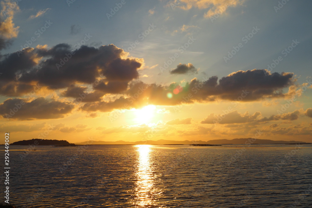Sunset on the sea, evening, golden sky
