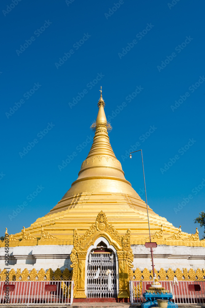 Lumbini, Nepal - Dec 10 2017: Myanmar Golden Temple in Lumbini, Nepal.  Lumbini, the Birthplace of the Lord Buddha and The Eight Great Places.  Photos | Adobe Stock