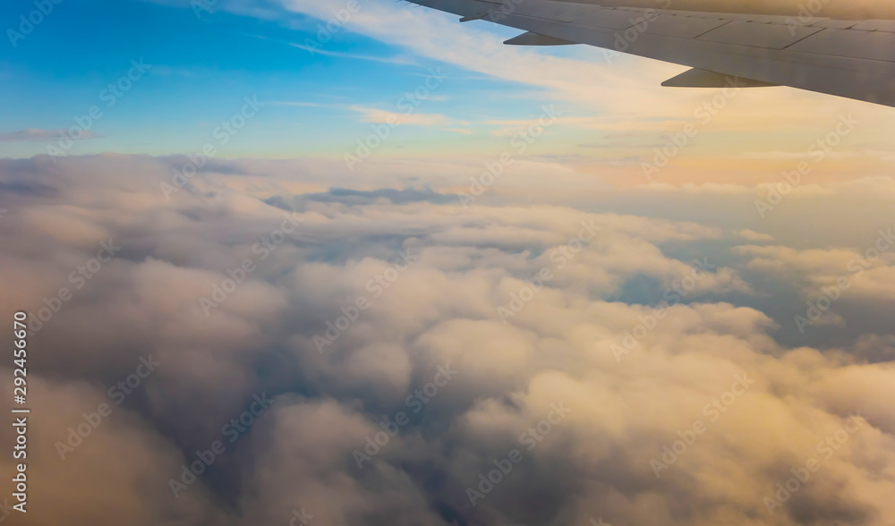 Fototapeta premium clouds in dramatic sunset. Travel fly cruise