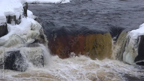 Waterfall Voitsky Padun close up, February day. Karelia, Russia    photo