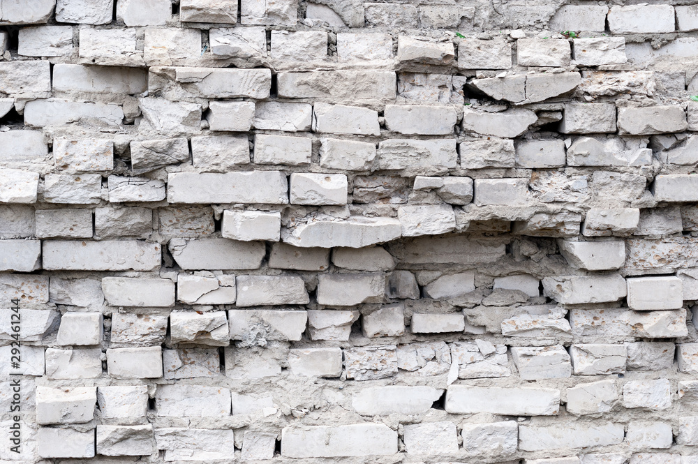 Obraz premium broken old brick wall background
