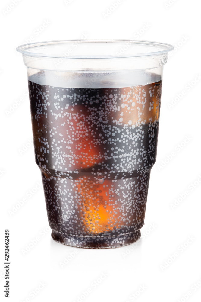 Cola carbonated drink with ice in a plastic cup isolated on white background Cola carbonated drink with ice in a plastic cup isolated on white background